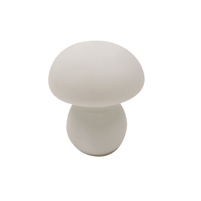 Mushroom table lamp in soft white glass, a domed shade over a rounded stem