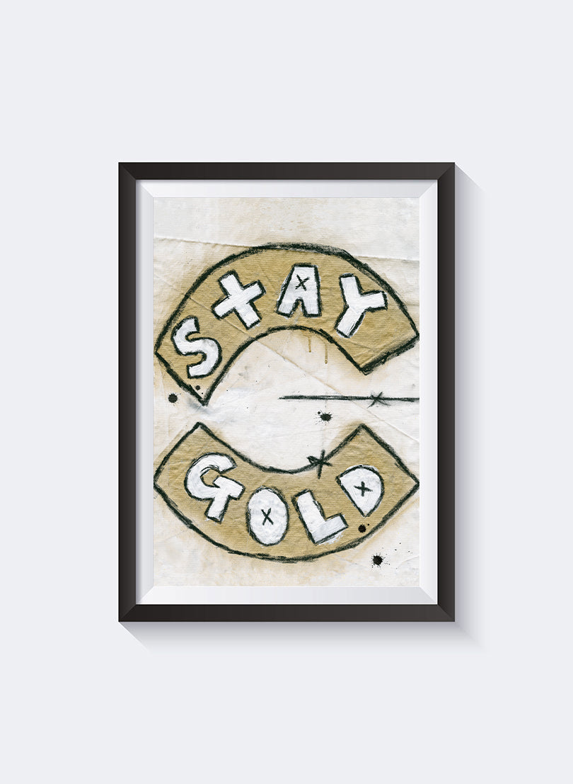 Stay Gold Dot A3 print by Federation, white block letters on two curved gold banners, shown in a black frame