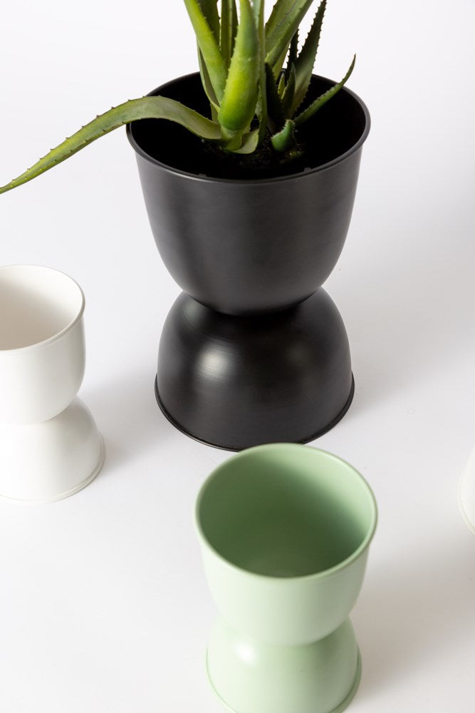Black Domes planter with a plant beside white and sage planters