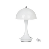 White table lamp with power cord on a white background