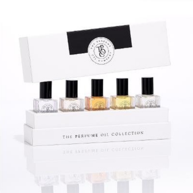 The MIDNIGHT perfume oil range by The Perfume Oil Company presented in a white box