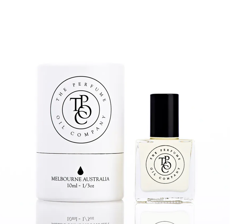 White Fig Roll-On Perfume Oils by The Perfume Oil Company next to a white box.