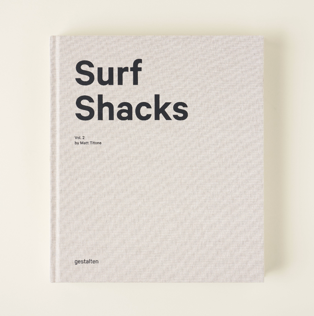 Front cover of Surf Shacks Volume 2 in textured linen