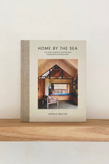 Books' Home By The Sea book cover featuring a home by the sea in Byron Bay.