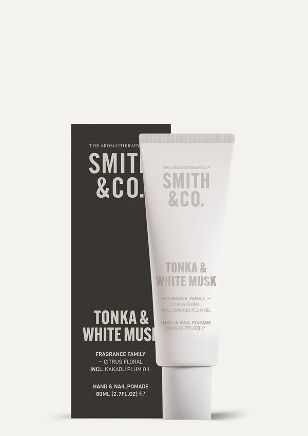 Tonka and White Musk hand cream tube standing beside its dark printed carton