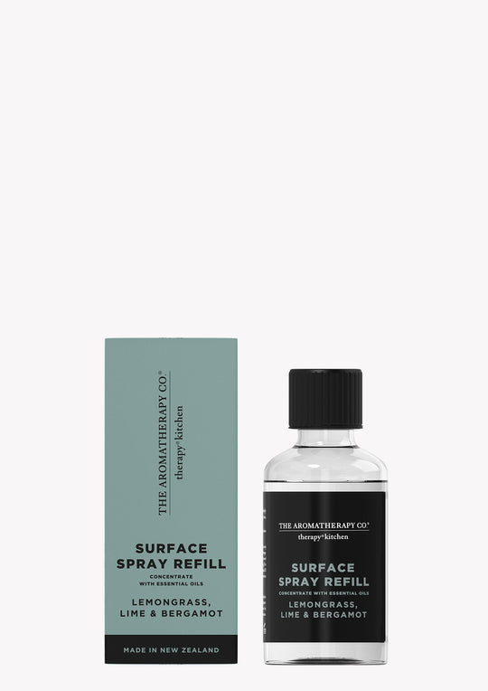 Therapy Kitchen surface spray refill bottle beside its sage green box