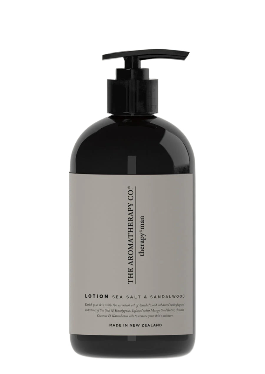 Dark Therapy Man bottle with a black pump and a warm grey Sea Salt & Sandalwood lotion label, on white