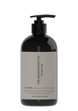 Black lotion bottle with pump and 'The Aromatherapy Co.' label on a white background
