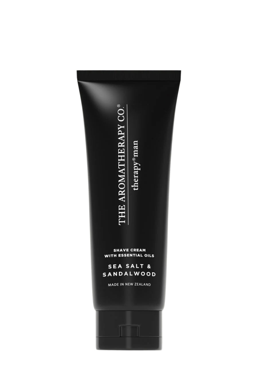 Black Therapy Man shave cream tube labelled Sea Salt & Sandalwood, standing against white