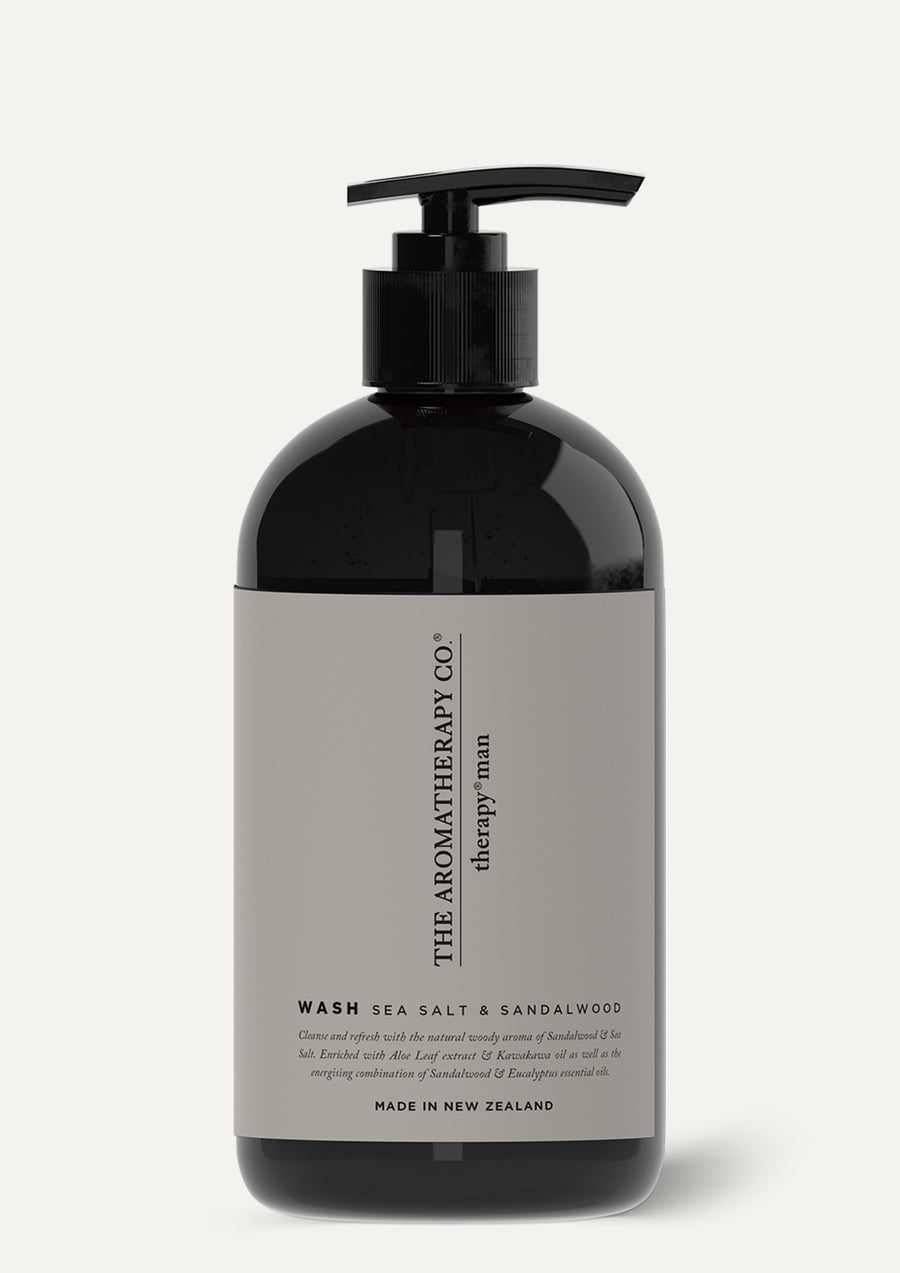 Therapy Man wash pump bottle standing on a warm off-white background with a soft shadow