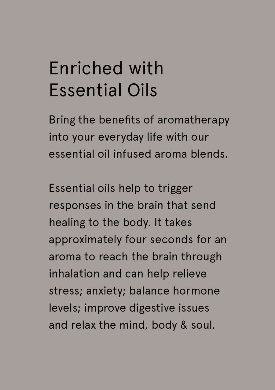 Enriched with Essential Oils supplier card with dark text on warm grey