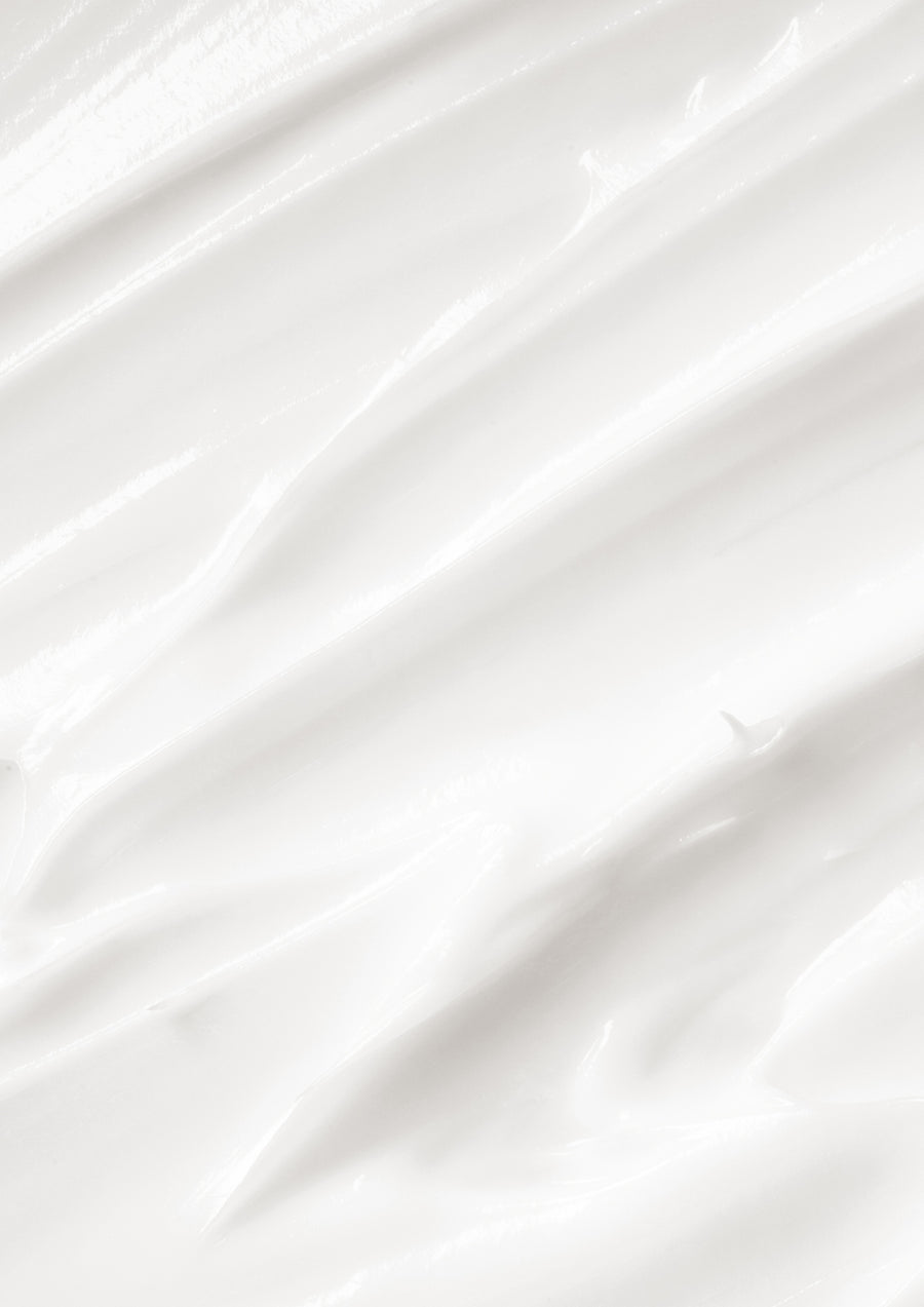 Close up of white lotion spread in streaks