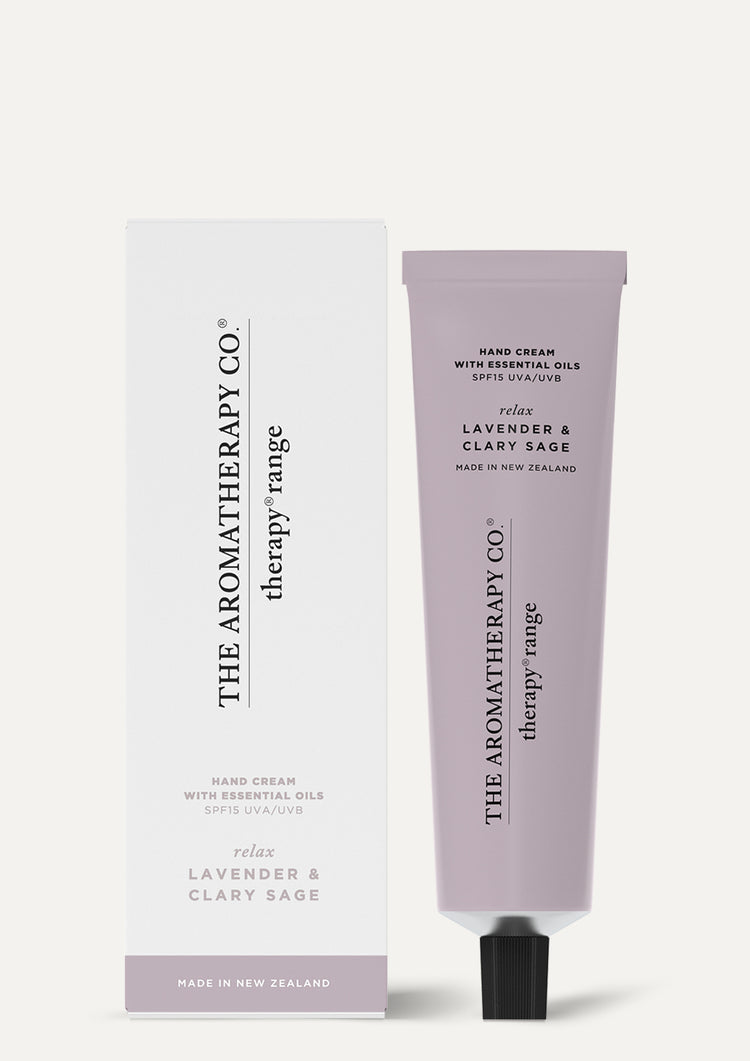 Relax hand cream tube and box standing on a warm off-white background with a soft shadow