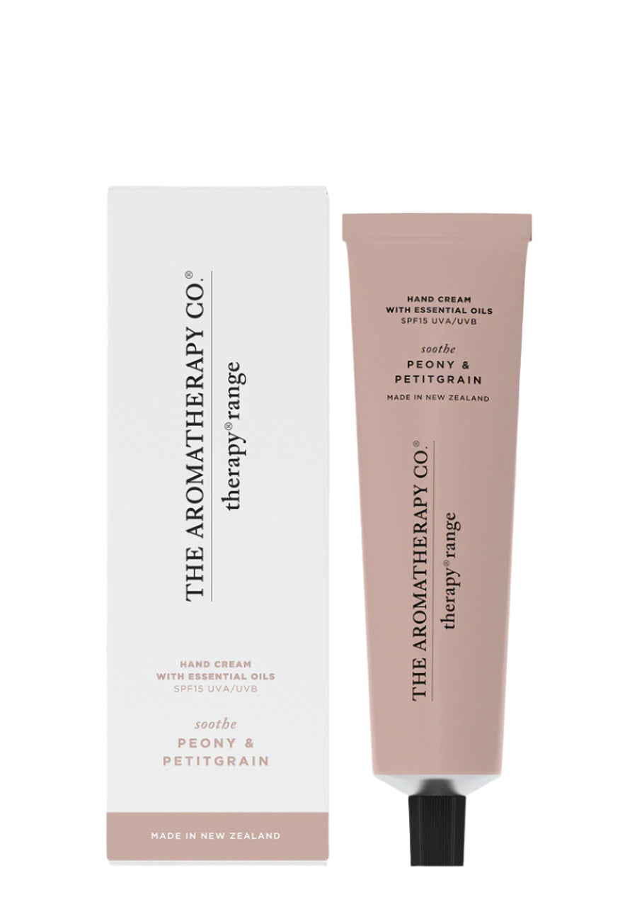 Therapy Soothe Peony & Petitgrain hand cream in a blush tube beside its white box