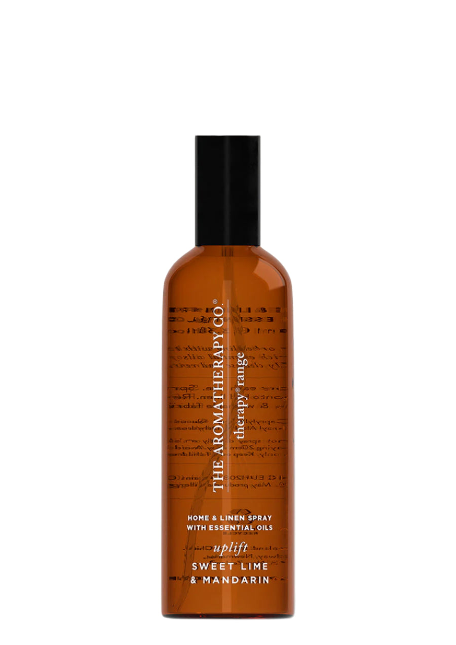 Therapy Uplift Sweet Lime & Mandarin room and linen spray in a tall amber bottle on white