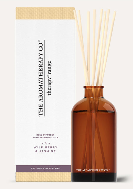 Therapy diffuser standing in front of its cream Wild Berry and Jasmine box
