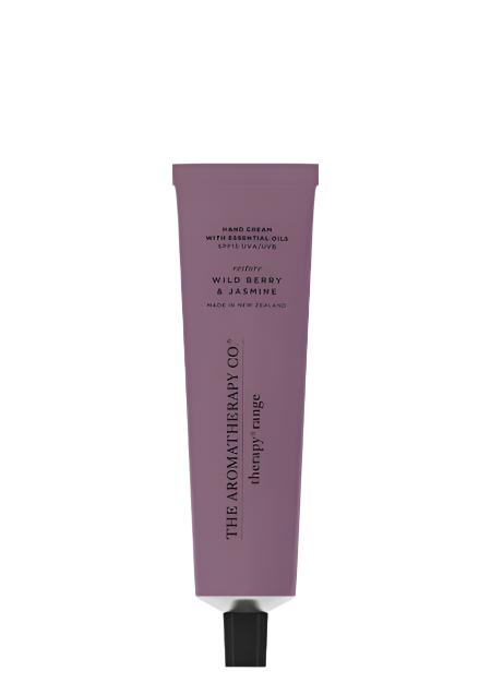 Therapy Wild Berry & Jasmine hand cream in a plum purple tube on a white background
