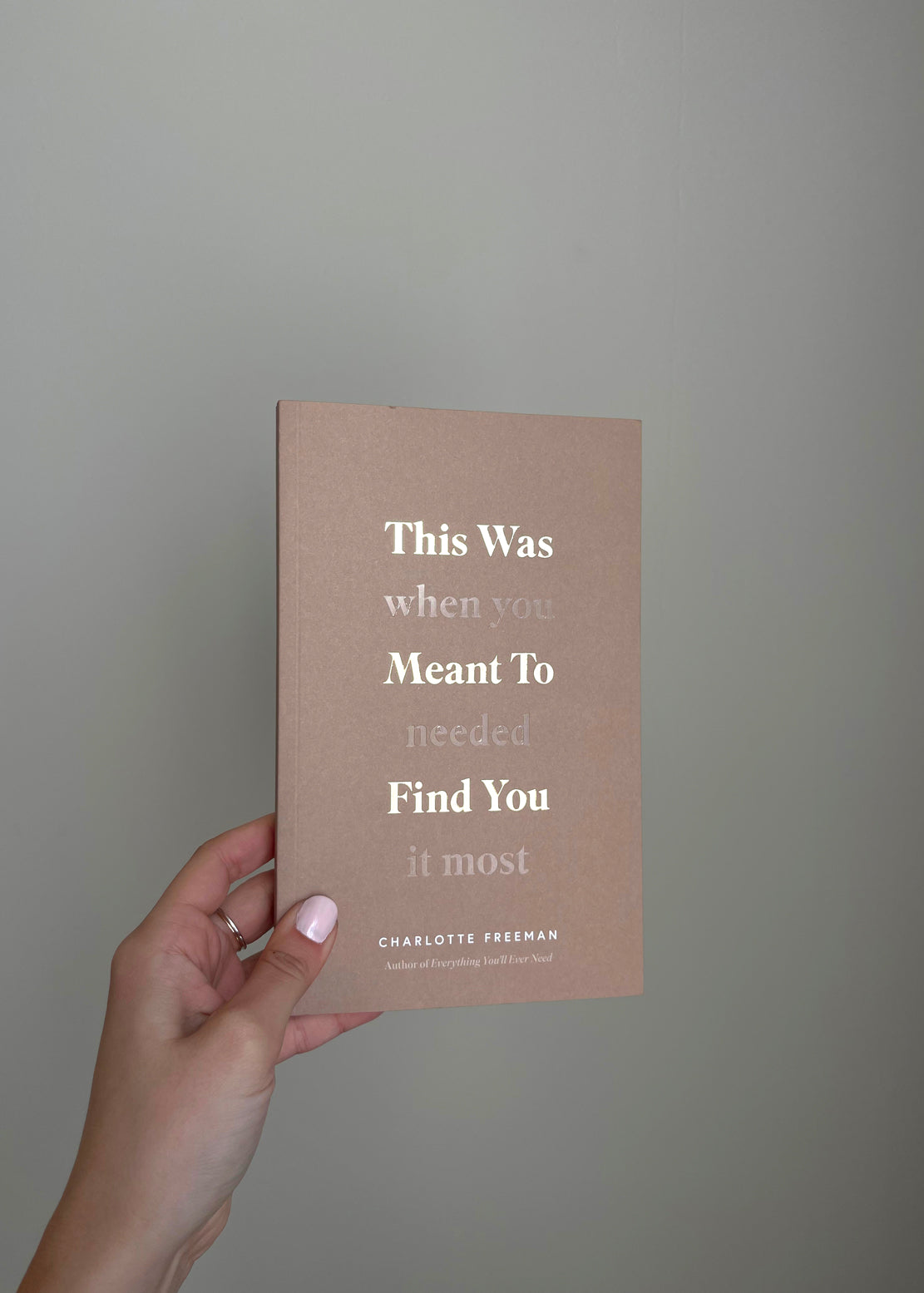 This Was Meant To Find You by Charlotte Freeman resting on a surface