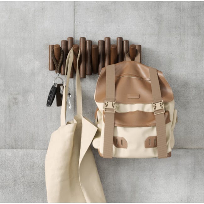 Umbra Picket wall hook styled in a hallway