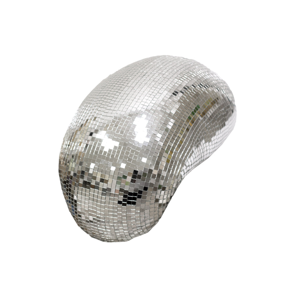 Melting disco ball sculpture in mirrored mosaic tiles, on a plain background