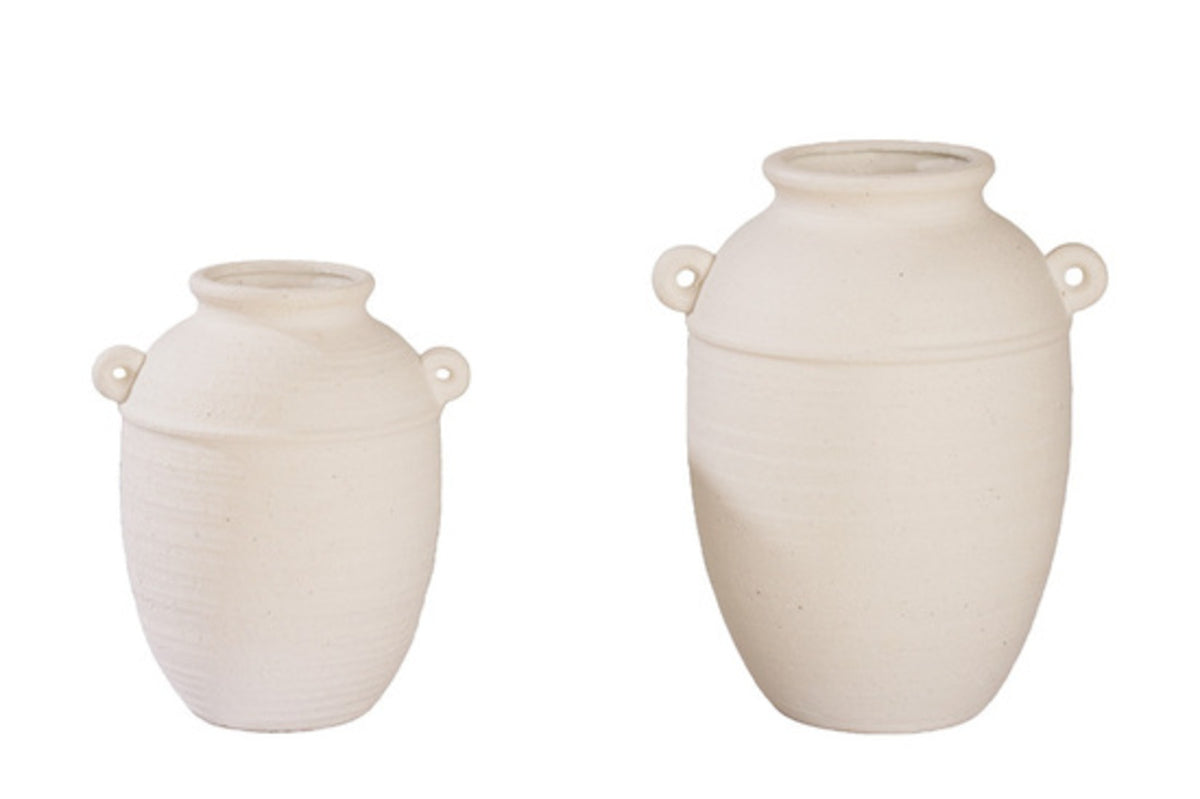 Vera terracotta urn in sand, large and small sizes shown together