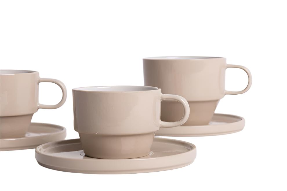 Hudson Porcelain Saucer stacked with Hudson Mugs on a shelf