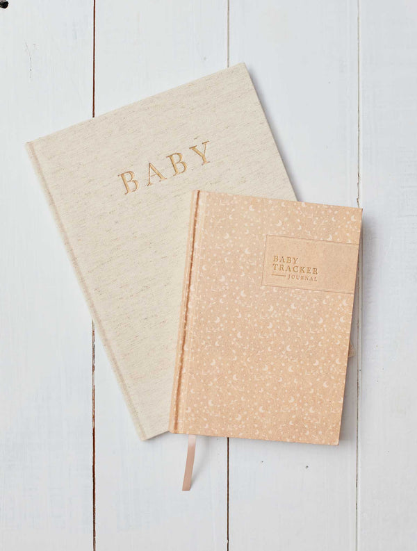 Two Write To Me BABY TRACKER JOURNALs with Daily Log pages.
