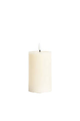 Medium natural ivory LED wax pillar candle with flickering flame, 7.5 x 12.5 cm