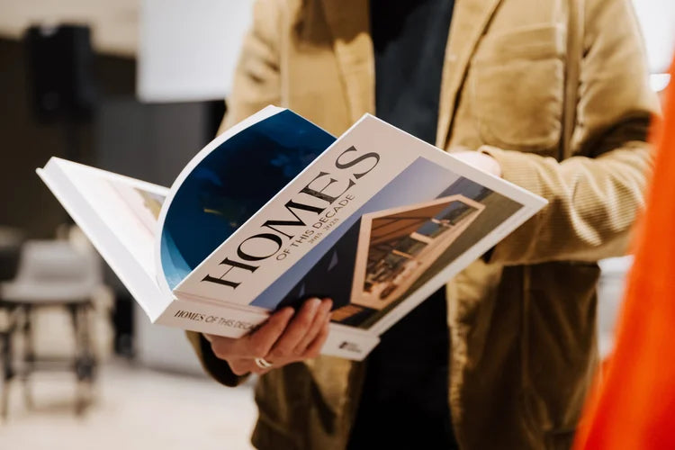 Homes of This Decade styled on a coffee table