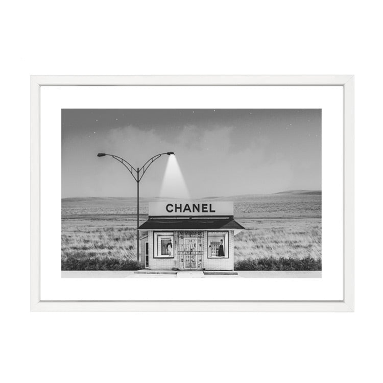 Chanel Shop black and white print by Papier HQ in a white frame