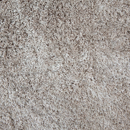 Close view of the silky taupe shaggy pile