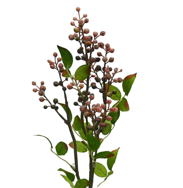 Artificial plant with berries and green leaves on a white background