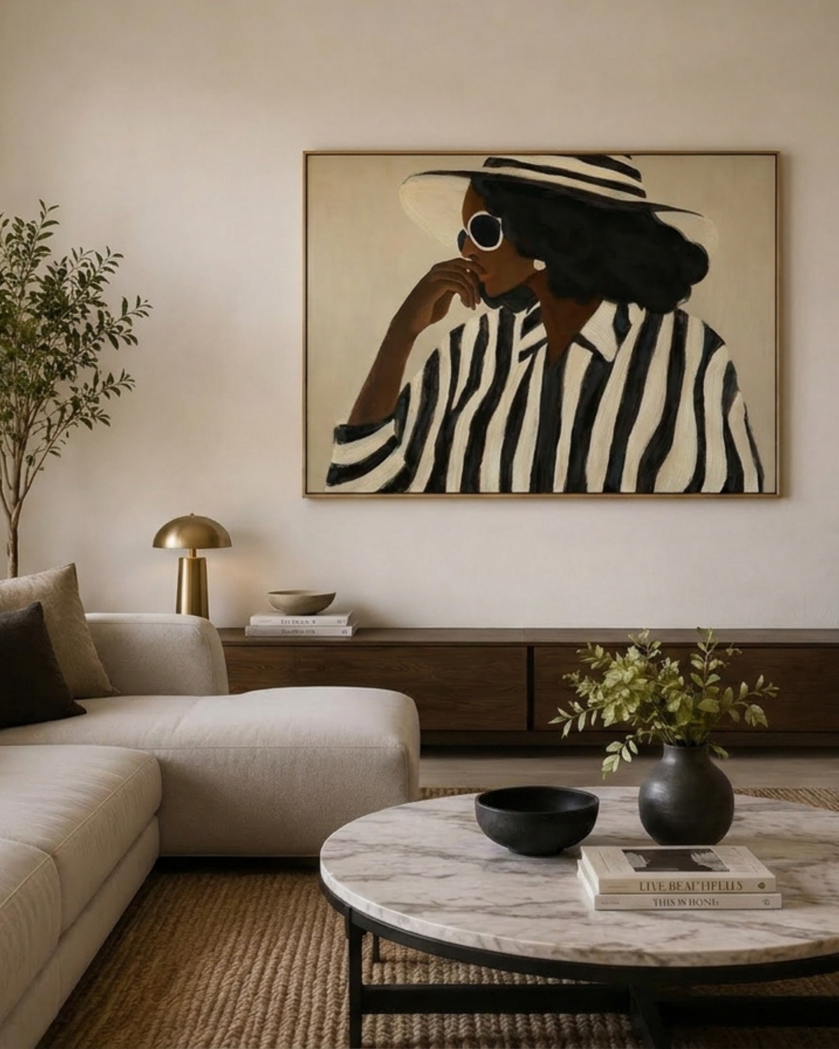 As Per Print above a walnut sideboard with a brass mushroom lamp, cream sofa and round marble coffee table