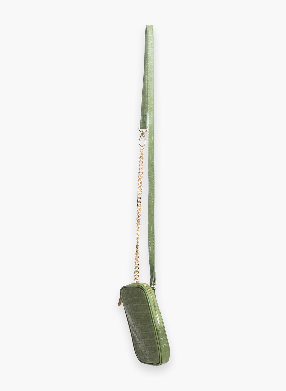 Olive green croc Attached To Me bag at an angle, showing the gold chain
