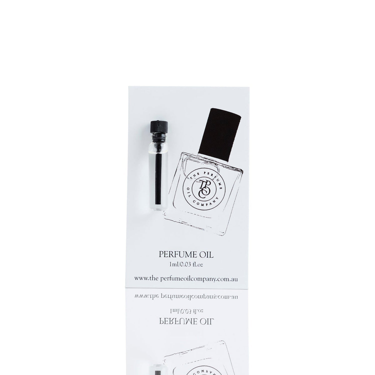 One millilitre perfume oil sample vial shown beside a full size roll-on bottle