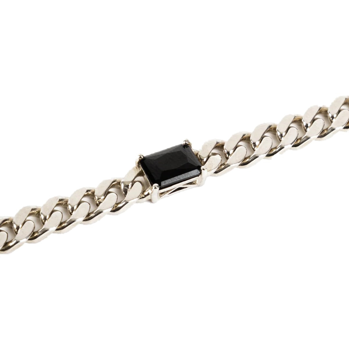 Close view of the rectangular black onyx set between silver curb links