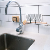 Good Change eco cloth in use on a kitchen bench, natural streak free cleaning