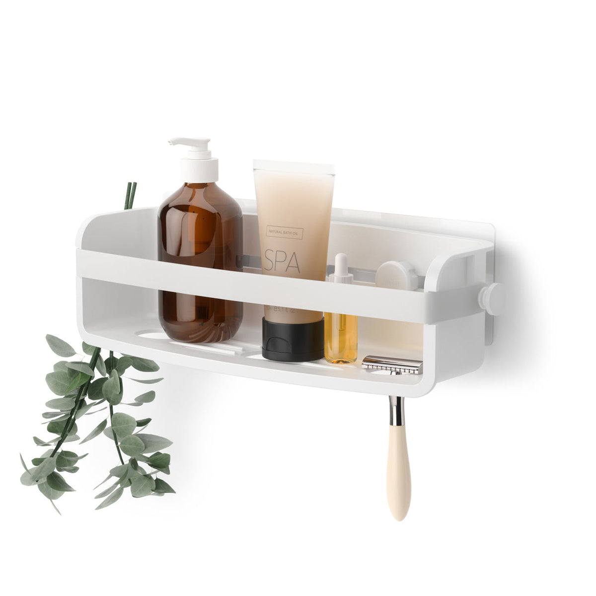 Umbra Flex adhesive shower bin in white holding bath bottles, a brush hanging below