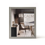 A calming lifestyle book called "Calm | Interiors to Nurture, Relax and Restore | Sally Denning" by Books.