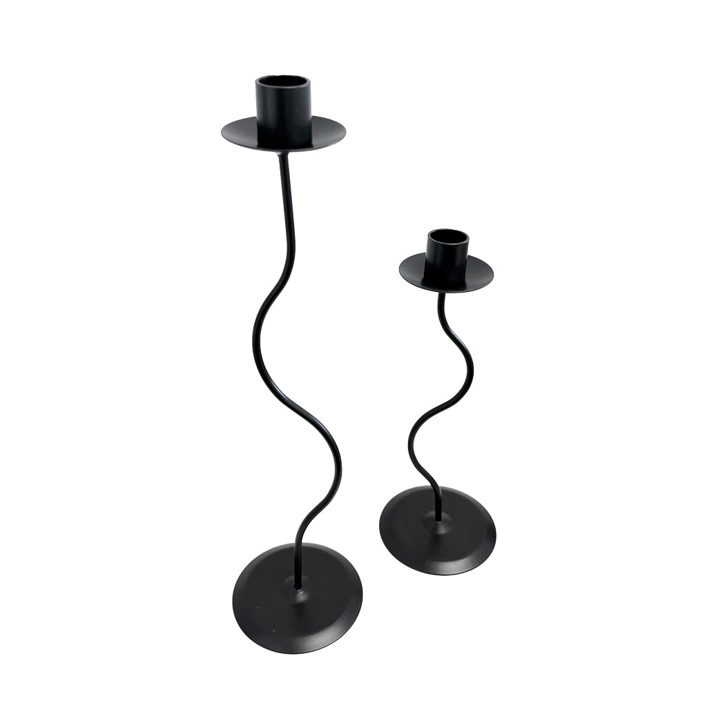 Tall and short black Hera candle holders with wavy stems, shown together on a white background