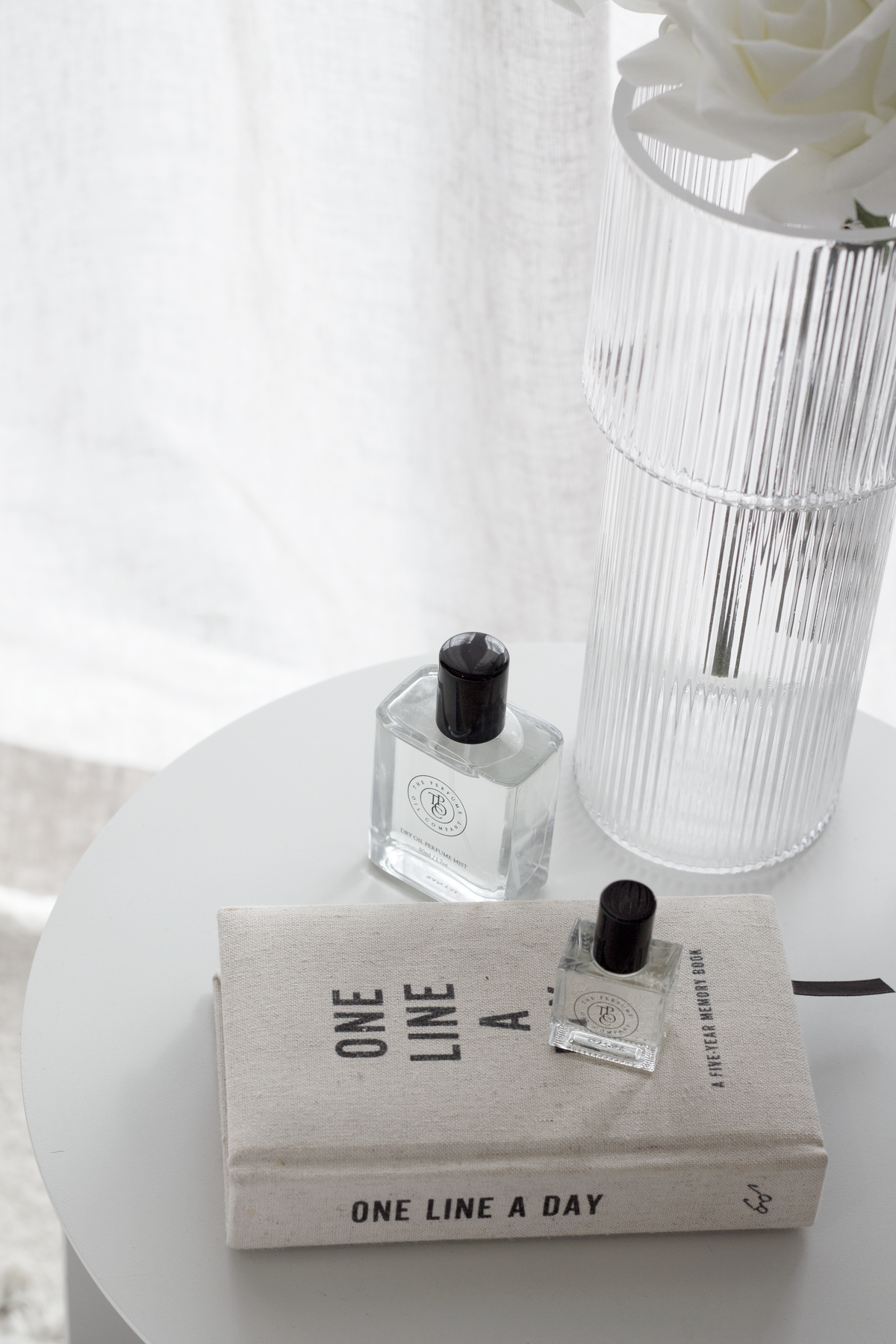 Canvas One Line A Day linen five year memory journal styled on neutral bedside table