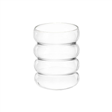 Caterpillar rippled glass tumbler in clear borosilicate glass, 300ml capacity, styled on a pale timber bench