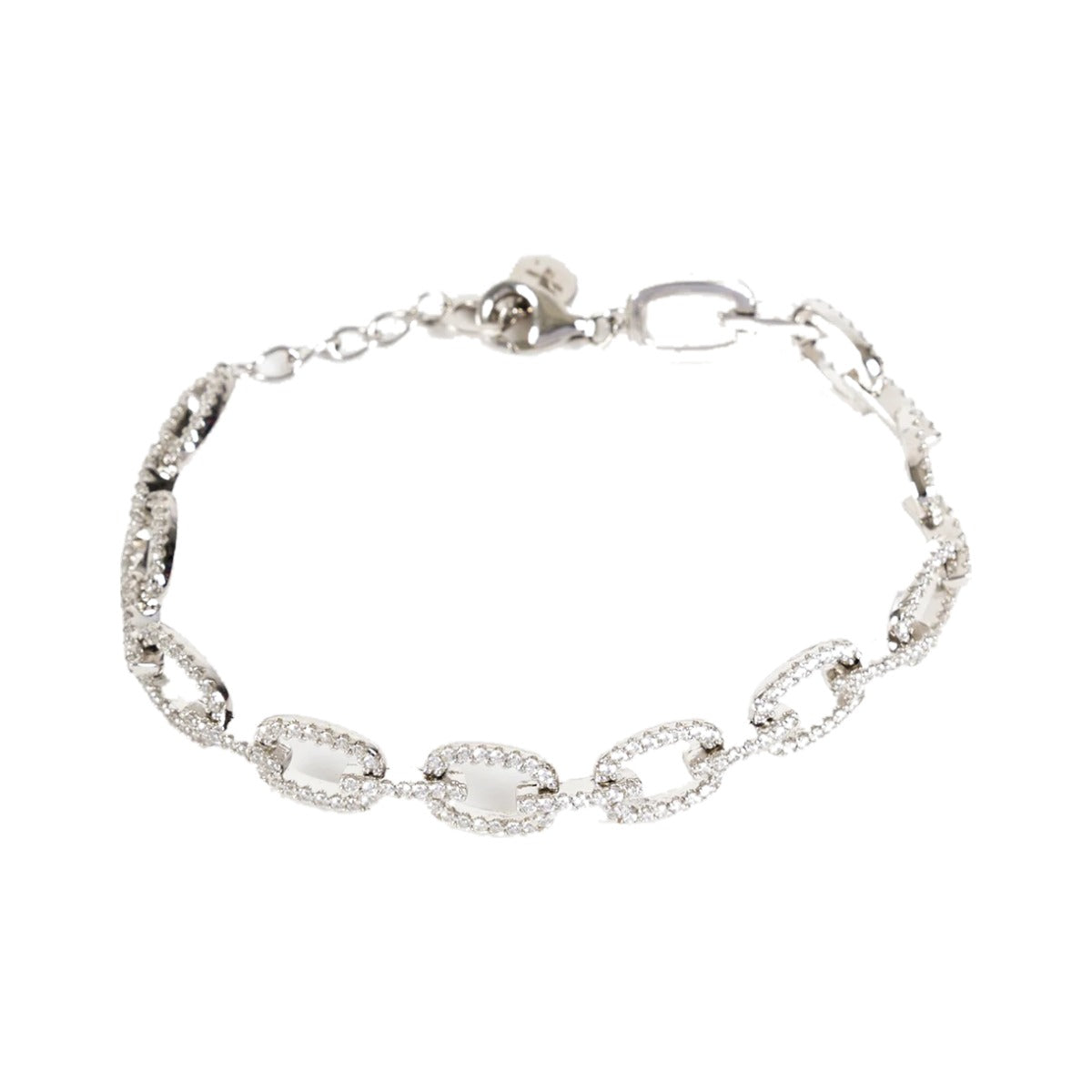 Chained Bracelet by Federation, oval sterling silver links set with clear zirconia, laid flat on white