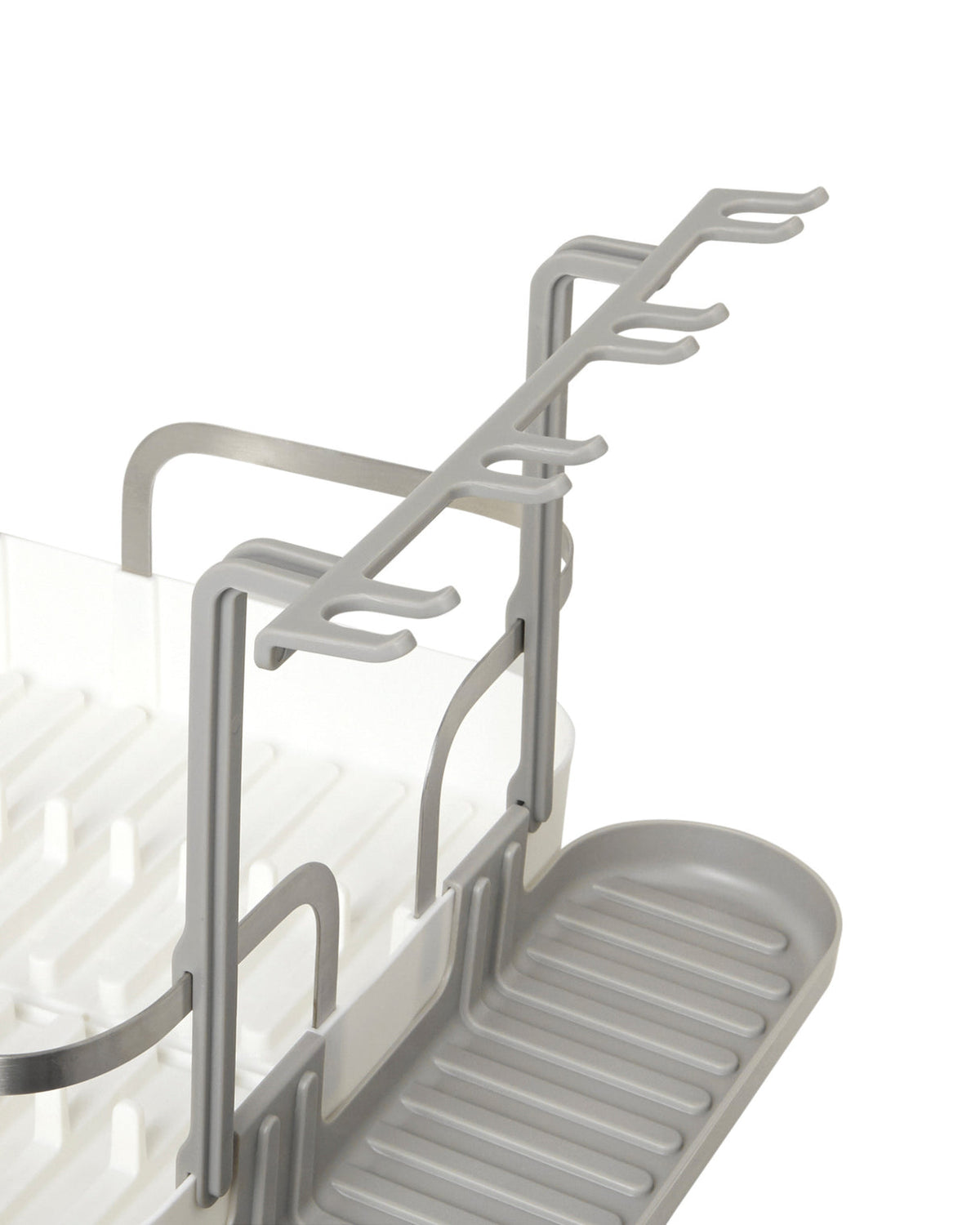 Close up of the stemware rail and grey side tray on the Holster dish rack