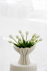 White compote vase with tulip arrangement on a pedestal, modern 3D-printed design, minimalist styling