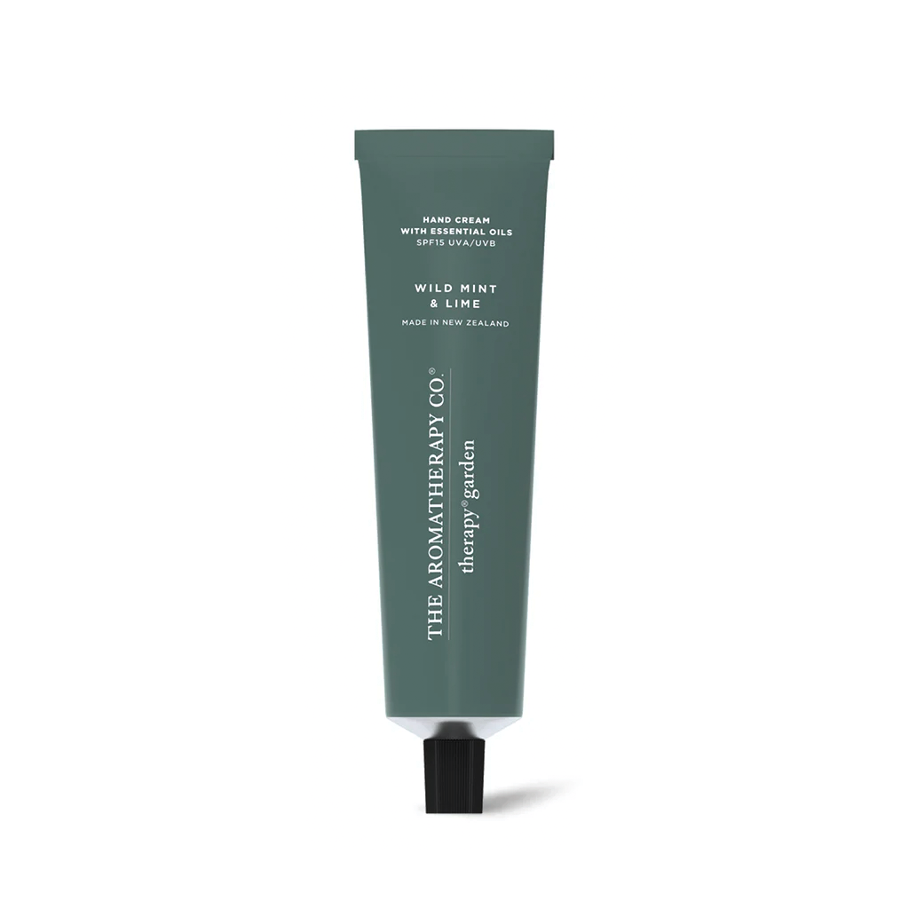 Therapy Garden Wild Mint & Lime hand cream in a deep green tube on a white background