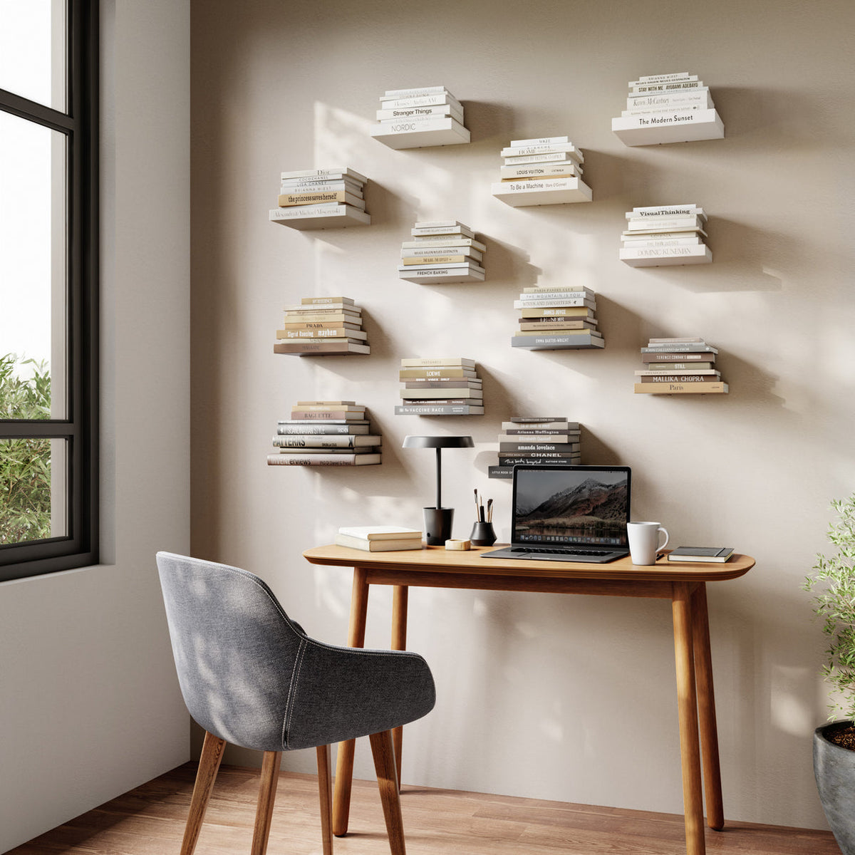 Umbra Conceal floating bookshelf mounted on a wall