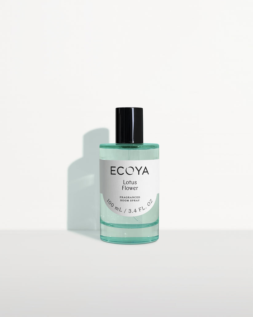 Ecoya room spray in pale aqua glass with a black cap on white