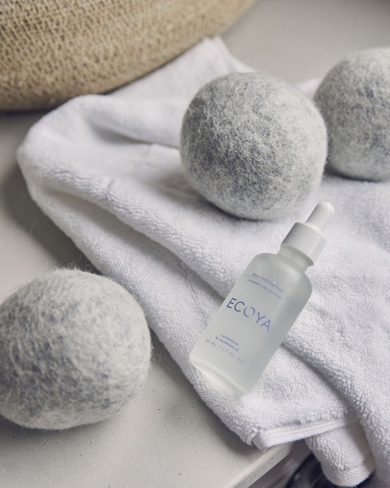 Ecoya Dryer Ball Set with NZ wool dryer balls, fragrance dropper, and linen storage bag for eco-friendly laundry care