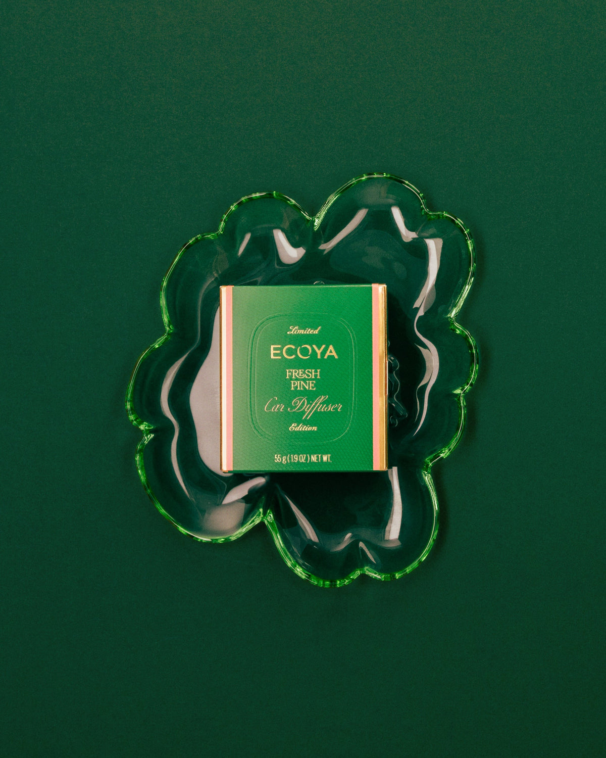 Ecoya Fresh Pine Car Diffuser gift box on a scalloped green glass dish